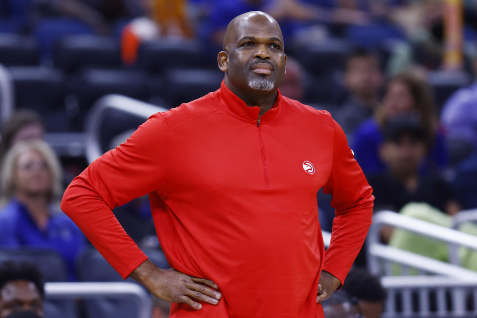 ORLANDO, FLORIDA - DECEMBER 15: Head coach Nate McMillan of the Atlanta Hawks looks on against the Orlando Magic during the first half at Amway Center on December 15, 2021 in Orlando, Florida. NOTE TO USER: User expressly acknowledges and agrees that, by downloading and or using this photograph, User is consenting to the terms and conditions of the Getty Images License Agreement. (Photo by Michael Reaves/Getty Images)