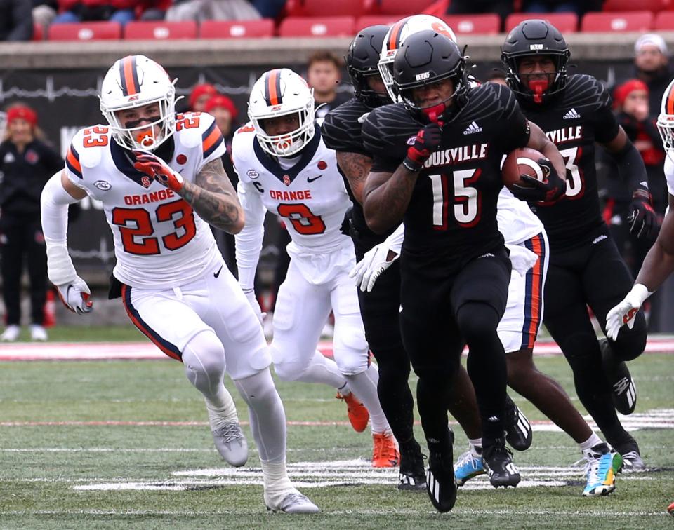 Louisville’s Jalen Mitchell ran for a first down against Syracuse.Nov. 13, 2021