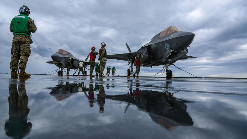 U.S. Marines conduct pre-flight checks on an F-35B Lightning II on the Royal Navy aircraft carrier HMS Queen Elizabeth in the Mediterranean Sea Nov. 24, 2021. (1st Lt. Zachary Bodner/Marine Corps)