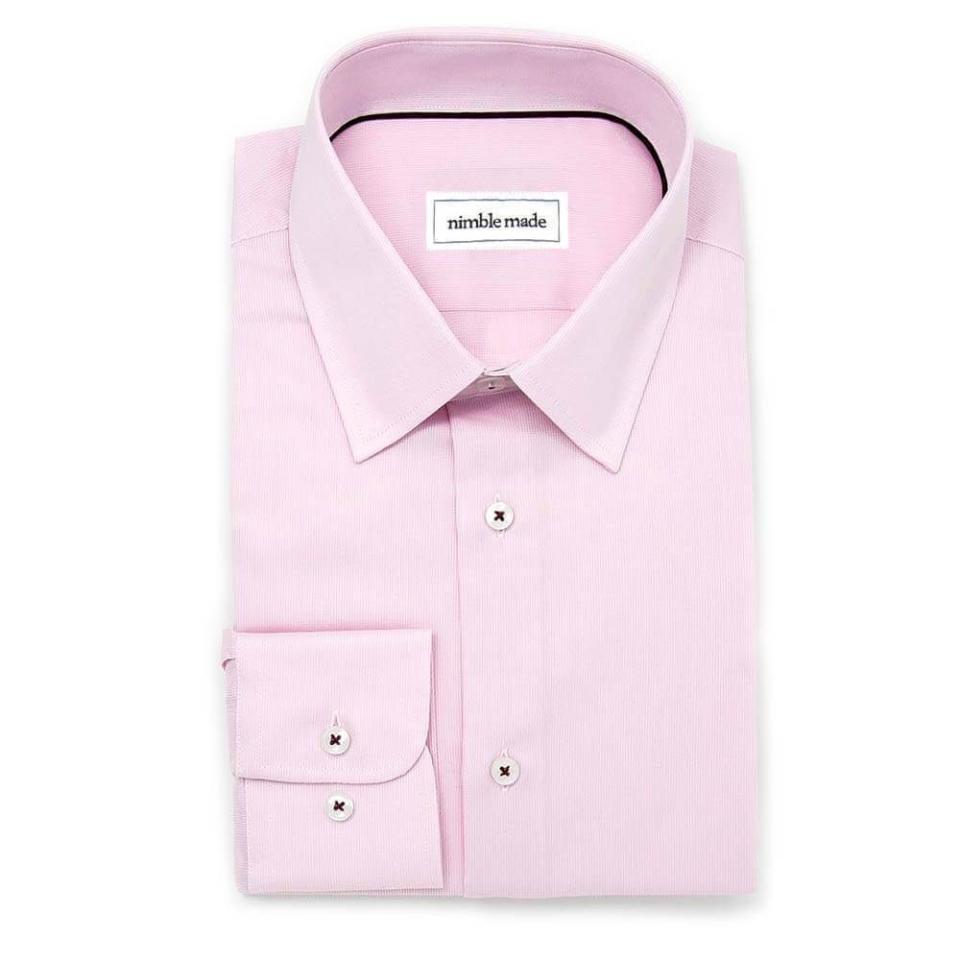 <p><strong>Nimble Made</strong></p><p>nimble-made.com</p><p><strong>$80.00</strong></p><p><a href="https://www.nimble-made.com/collections/professional-dress-shirts/products/pink-jacquard-weave" rel="nofollow noopener" target="_blank" data-ylk="slk:Shop Now" class="link ">Shop Now</a></p><p>This dress shirt is made of 100 percent super soft and crisp cotton that your guy can throw on for work or date night. The best part? It has engraved edges that stylishly keep the collar down.<br></p>