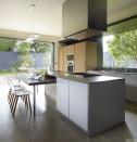 <p>In a <a href="https://www.elledecor.com/design-decorate/house-interiors/a8879/modern-house-design/" rel="nofollow noopener" target="_blank" data-ylk="slk:minimal Mexican home,;elm:context_link;itc:0;sec:content-canvas" class="link ">minimal Mexican home,</a> the kitchen cabinetry, vent hood, and table are by Boffi, the countertop is Caesarstone, the sink fittings are by Dornbracht, the range is by Wolf, and the ovens are by Miele.</p>