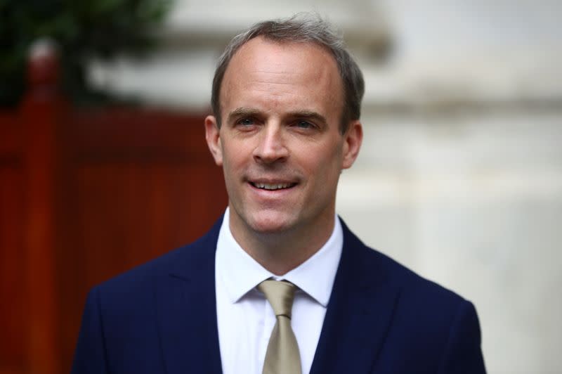 FILE PHOTO: Britain's Foreign Secretary Dominic Raab reacts as he makes a statement on Hong Kong's national security legislation in London
