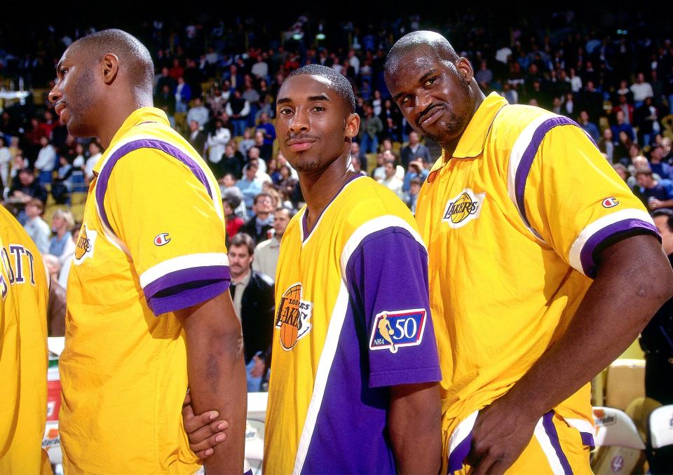 Bryant and longtime teammate Shaquille O'Neal pose for a shot during the national anthem before a game back in the '90s.