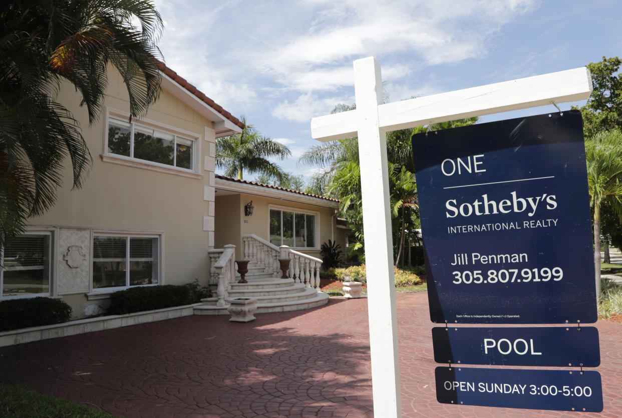 A for sale sign is posted in front of a home in Miami. Florida was the most popular destination for foreign homebuyers, the National Association of Realtors found. (Credit: Lynne Sladky, AP Photo)