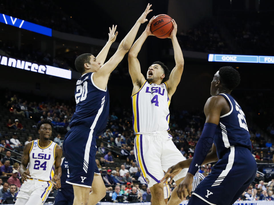 <p>LSU Tigers guard Skylar Mays (4) shoots the ball as Yale Bulldogs forward Paul Atkinson (20) defends in the first round of the 2019 NCAA Men’s Basketball Tournament held at VyStar Veterans Memorial Arena on March 21, 2019 in Jacksonville, Florida. (Photo by Matt Marriott/NCAA Photos via Getty Images) </p>