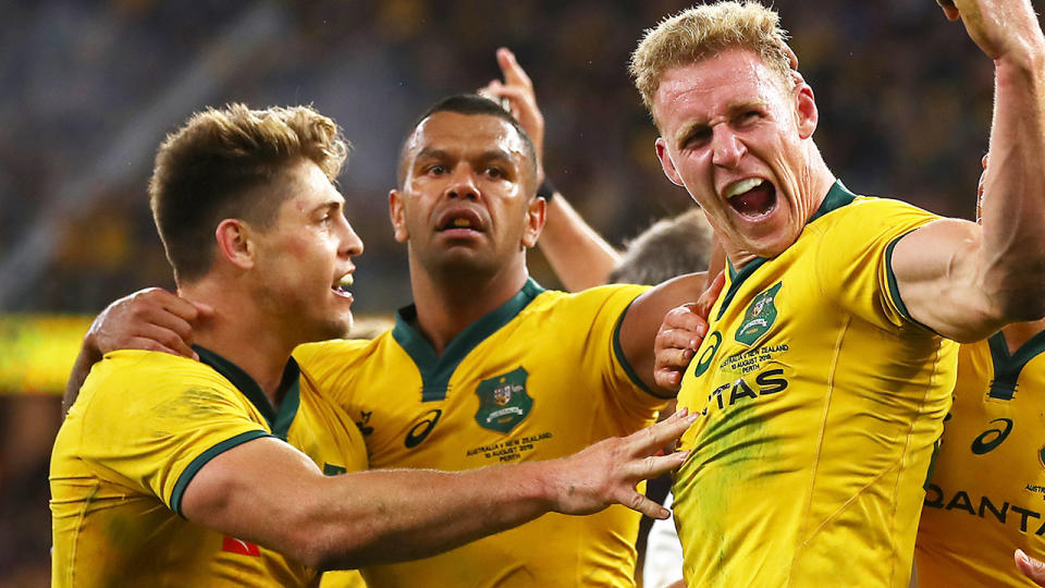 Reece Hodge, pictured celebrating a try, contributed to the highest score the Wallabies have ever posted against the All-Blacks.