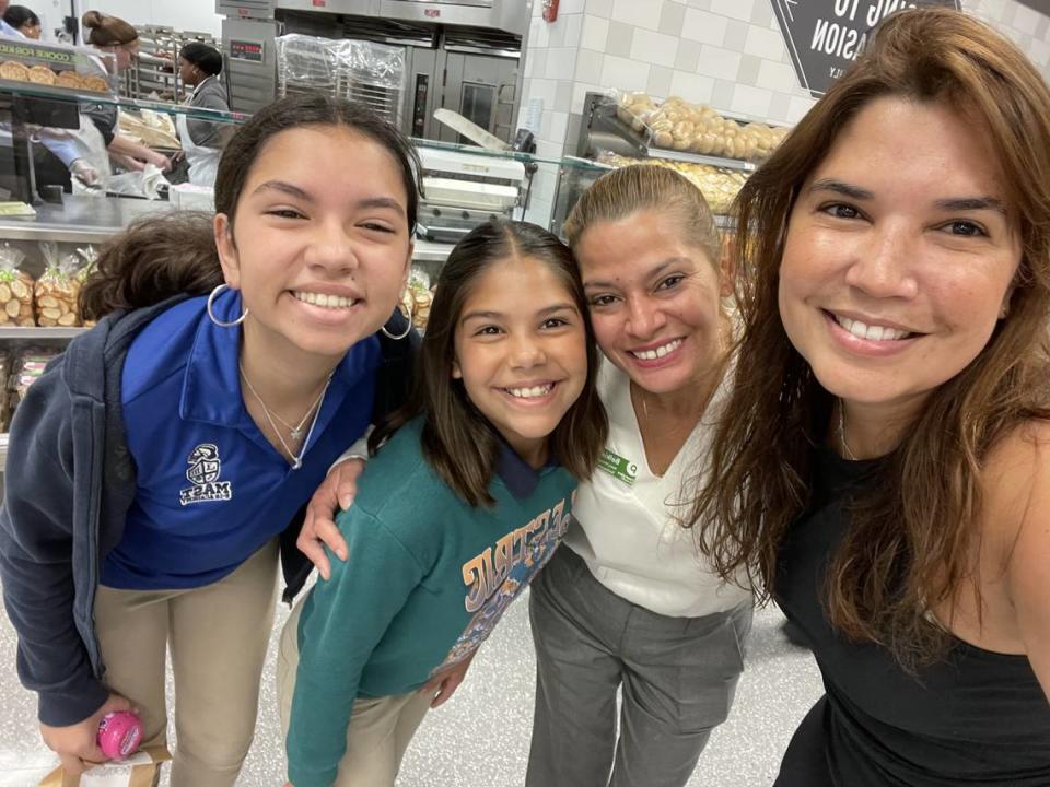 Shopper Gisela Rodríguez and her daughters Pilar and Amelia arrived early at the new Hialeah Heights Publix.