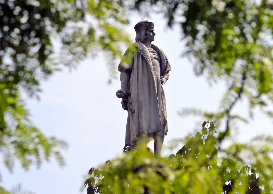 FILE - This Aug. 27, 2017 file photo shows the Christopher Columbus statue at Manhattan's Columbus Circle in New York. Maine Gov. Janet Mills signed a bill on Friday, April 26, 2019, changing Columbus Day to Indigenous People's Day in the state. Vermont is also poised to act on a similar bill as several states have done away with celebrating the explorer in deference to Native Americans, though the federal Columbus Day holiday remains. (AP Photo/Bebeto Matthews, File)