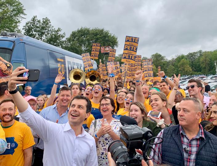 South Bend, Indiana Mayor Pete Buttigieg poses for a selfie with his supporters at the Polk County Steak Fry.