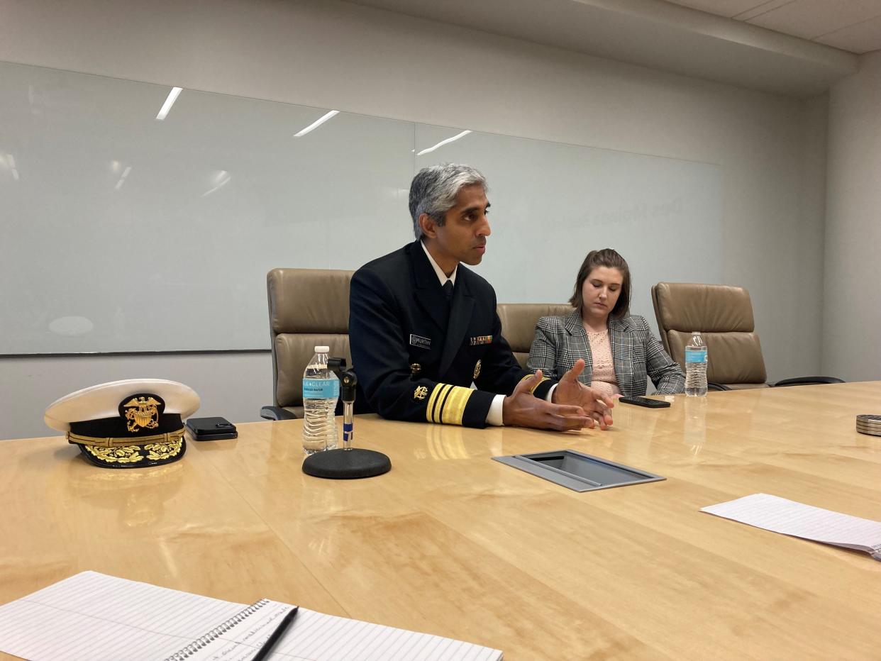 U.S. Surgeon General Dr. Vivek Murthy speaks to reporters during a stop at the Des Moines Register office on Wednesday, April 3, 2024.