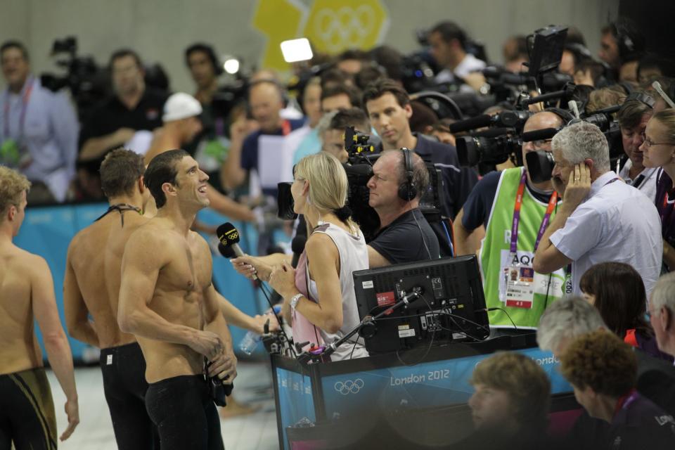 U.S. Olympian Michael Phelps is interviewed during the 2012 London Summer Olympics. Entering his fifth Olympic Games in 2016, Phelps is the center of much media attention. (Getty)