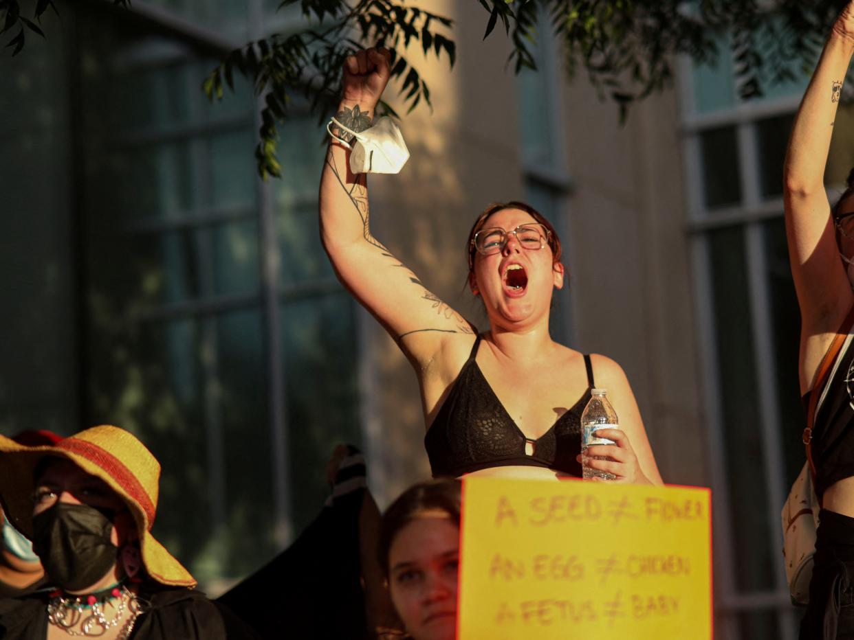 Abortion rights protesters chant during a Pro Choice rally at the Tucson Federal Courthouse in Tucson, Arizona on Monday, July 4, 2022.