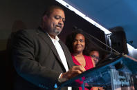 Alvin Bragg, a former top deputy to New York's attorney general, becomes emotional as he is joined by his family as he speaks to supporters in New York, late Tuesday, June 22, 2021. (AP Photo/Craig Ruttle)