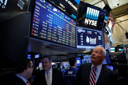 Leaf Group CEO Sean Moriarty and Chairman of the Board James Quandt walk on the trading floor at the New York Stock Exchange (NYSE) in Manhattan, New York City, U.S., February 27, 2017. REUTERS/Andrew Kelly