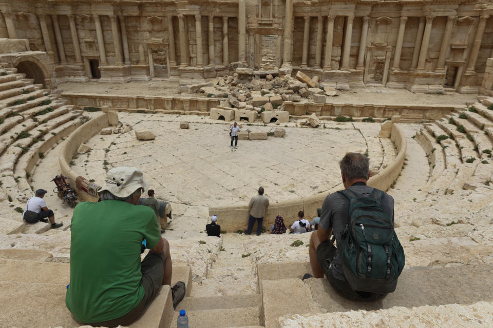 Tourists visit Roman ruins in Palmyra, Syria, Tuesday, May 11, 2023. Palmyra was captured by the Islamic Stae militants in 2015, who blew up some of the most iconic strictures. (AP Photo/Omar Sanadiki)