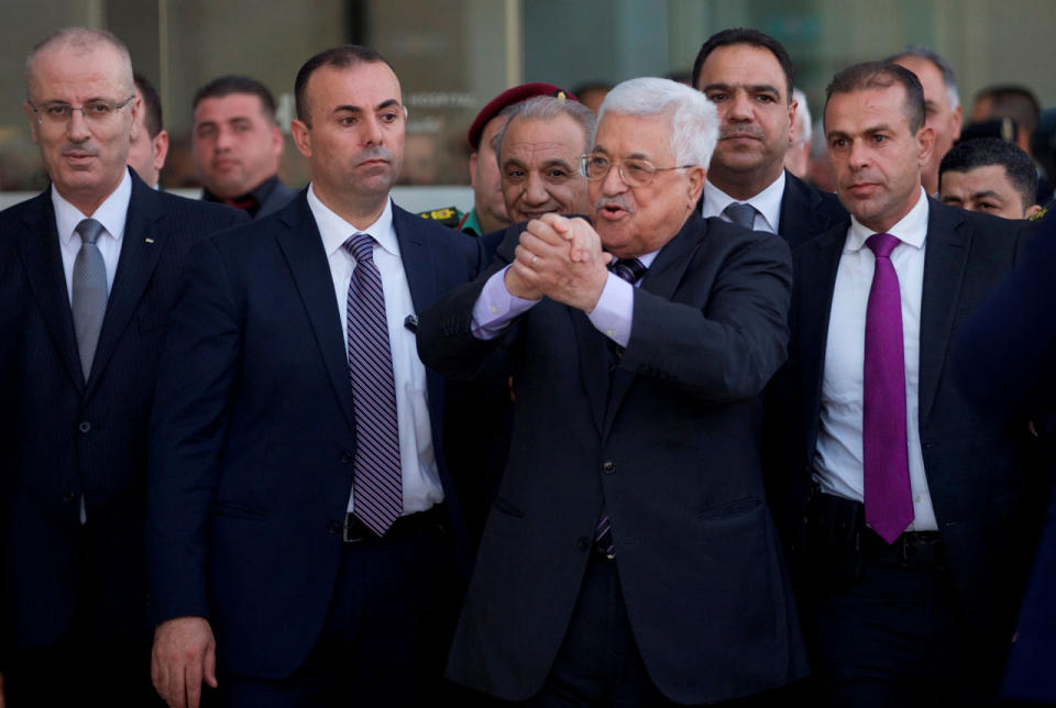 Palestinian President Mahmoud Abbas leaves a hospital in Ramallah, West Bank