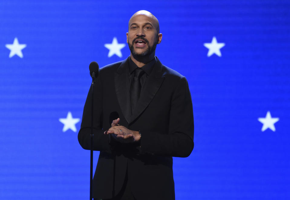 Keegan-Michael Key presents the lifetime achievement award at the 25th annual Critics' Choice Awards on Sunday, Jan. 12, 2020, at the Barker Hangar in Santa Monica, Calif. (AP Photo/Chris Pizzello)