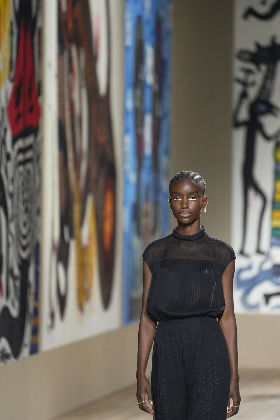 A model wears a creation for the Dior Spring-Summer 2022 Haute Couture fashion collection collection, in Paris, Monday, Jan. 24, 2022. (AP Photo/Michel Euler)