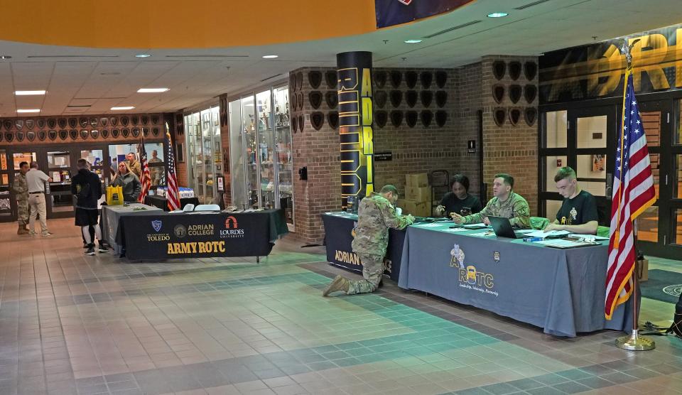 Rain showers on Friday, April 12, 2024, moved several events indoors for Adrian College's "Meet the Army Community Day." Informational booths and tables are seen here inside the lobby of the Merillat Sport and Fitness Center for the Reserve Officers’ Training Corps (ROTC).