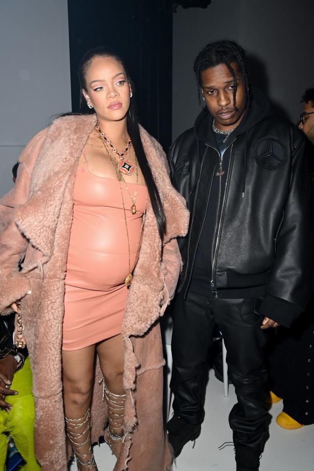 Pregnant Rihanna Shows Off Her Baby Bump in Camo Jacket & Dad Sneakers –  Footwear News