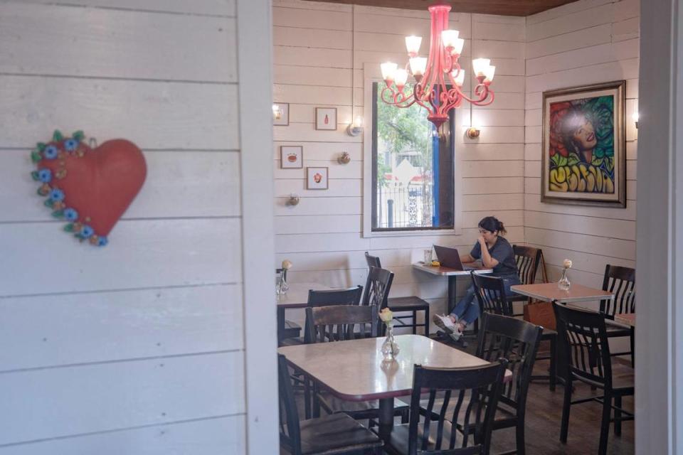 A customer works in one of the many nooks of Casa Azul on Tuesday, June 28, 2022, in Fort Worth, Texas. The business space was converted from a home.