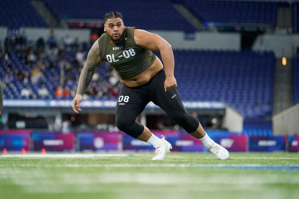 Former Baylor defensive lineman Siaki Ika runs a drill at the NFL Scouting Combine in Indianapolis on March 2. The Browns recently drafted Ika in the third round.