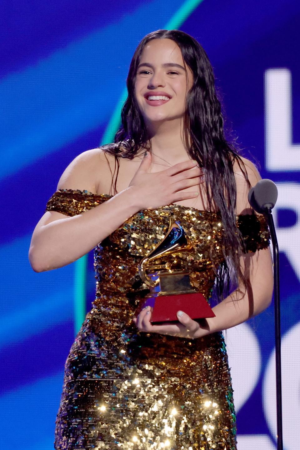 Rosalía accepts album of the year for "Motomami" onstage during the 23rd annual Latin Grammy Awards on Nov. 17, 2022, in Las Vegas.