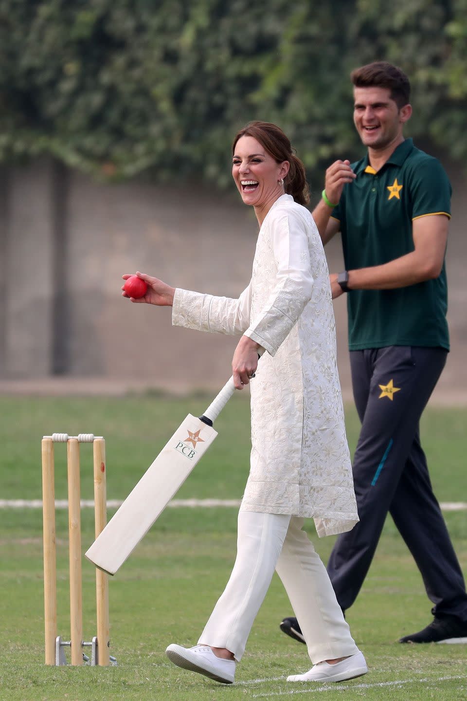<p>On <a href="https://www.townandcountrymag.com/society/tradition/g29431002/kate-middleton-prince-william-pakistan-royal-tour-photos-2019/" rel="nofollow noopener" target="_blank" data-ylk="slk:a 2019 trip to Pakistan;elm:context_link;itc:0;sec:content-canvas" class="link ">a 2019 trip to Pakistan</a>, Kate visited the National Cricket Academy and tried out the popular sport. </p>