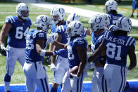 Indianapolis Colts' Jonathan Taylor (28) celebrates with Noah Togiai (86) after running for a touchdown during the first half of an NFL football game, Sunday, Sept. 20, 2020, in Indianapolis. (AP Photo/Michael Conroy)