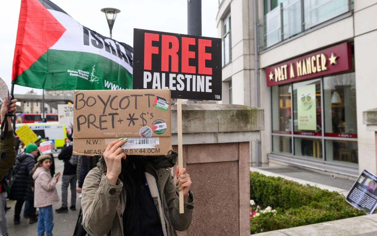 Banners outside a Pret branch during a demonstration against Israel's ongoing military offensive in Gaza