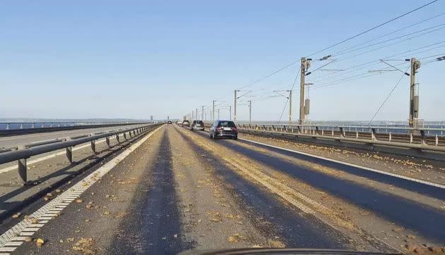 Potatoes are seen scattered across the carriageway on the western part of the Great Belt Bridge, Denmark on June 1. 