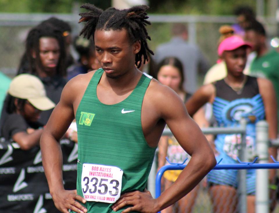 Nease's Cyrus Ways (3353) prepares to run the boys 300-meter hurdles final at the Bob Hayes Invitational Track Meet.