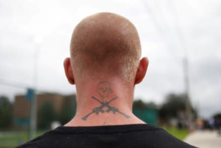 Tyler Tenbrink, a self proclaimed White Nationalist who drove from Texas, stands before the speech by Richard Spencer, an avowed white nationalist and spokesperson for the so-called alt-right movement, on the campus of the University of Florida in Gainesville, Florida, U.S., October 19, 2017. REUTERS/Shannon Stapleton REUTERS/Shannon Stapleton