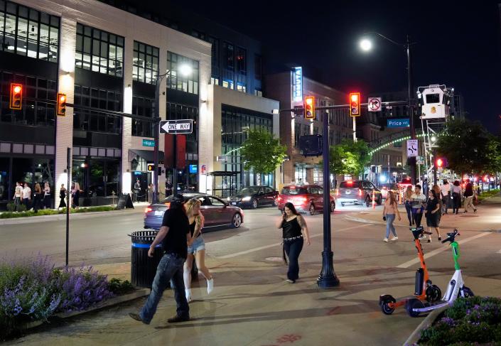 May 19, 2023; Columbus, Ohio, USA; In the wake of the gun violence Columbus police had an increased presence in cruisers, on bicycles and on foot in the Short North. Columbus Mayor Andrew J. Ginther requested that businesses voluntarily close at midnight for the upcoming weekend.