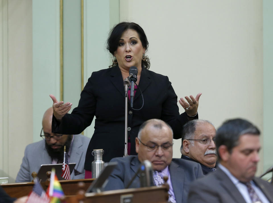 Assemblywoman Lorena Gonzalez, D-San Diego, urges lawmakers to approve her measure to give new wage and benefit protections at the so-called gig economy companies like Uber and Lyft, during the Assembly session in Sacramento, Calif., Wednesday, Sept. 11, 2019. Gonzalez' bill AB5, was approved and now goes to the governor, who has said he supports it. (AP Photo/Rich Pedroncelli)