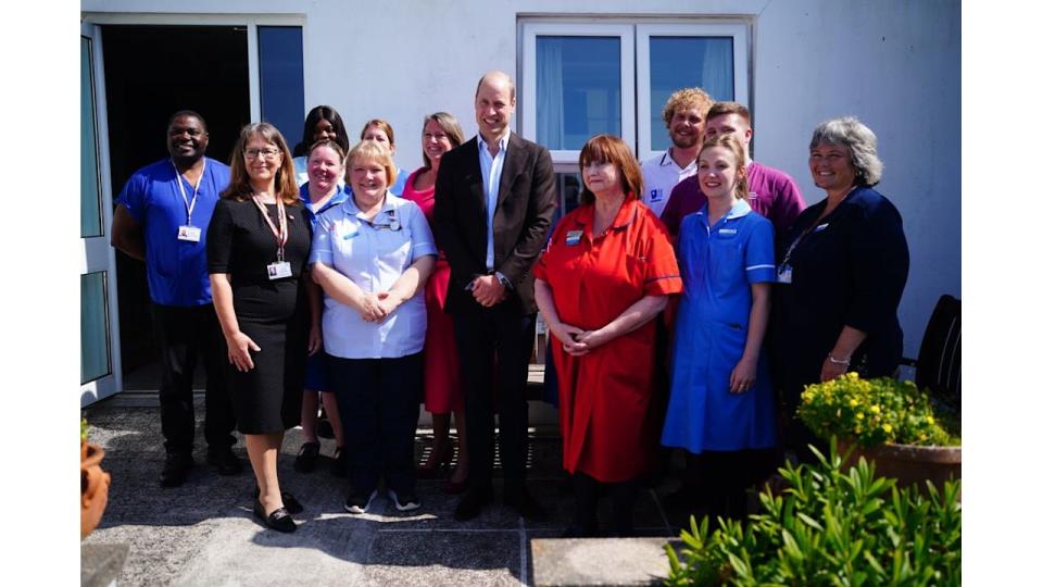 Prince William with staff from St. Mary's Community Hospital