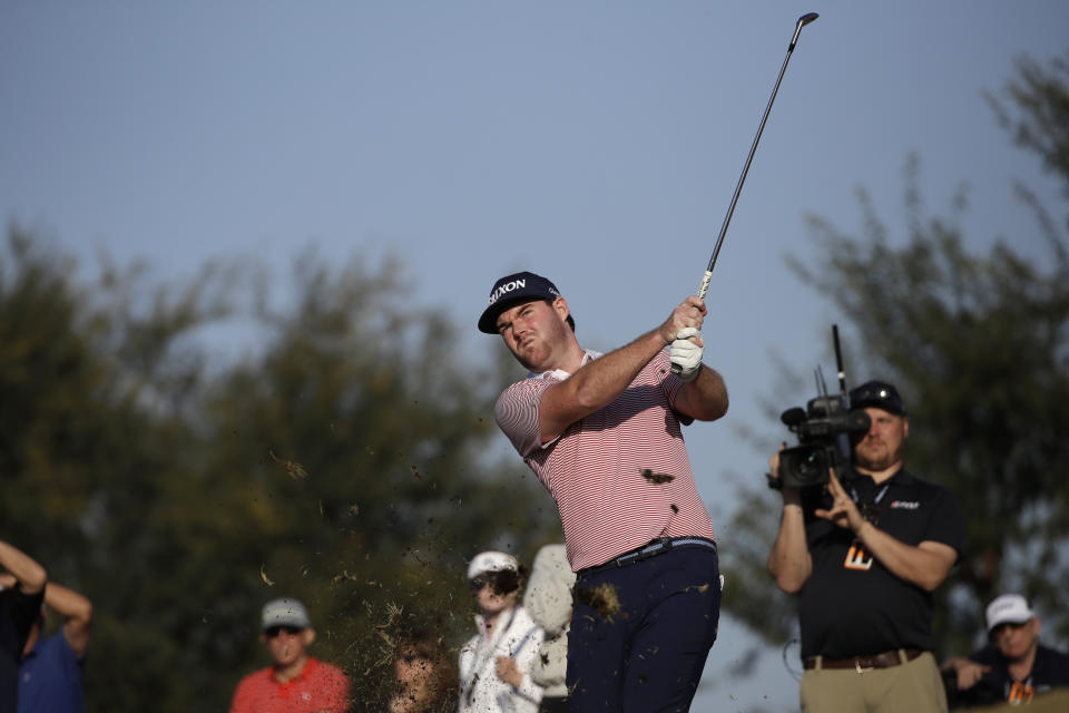 Grayson Murray hits from the rough on the ninth hole during the first round of The American Express golf tournament on the Stadium Course at PGA West on Thursday, Jan. 16, 2020, in La Quinta, Calif. (AP Photo/Marcio Jose Sanchez)