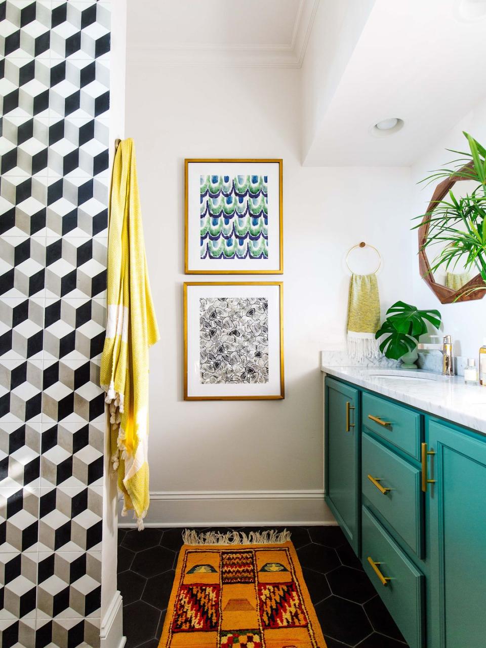 teal cabinets, black flooring, patterned rug, fake plants