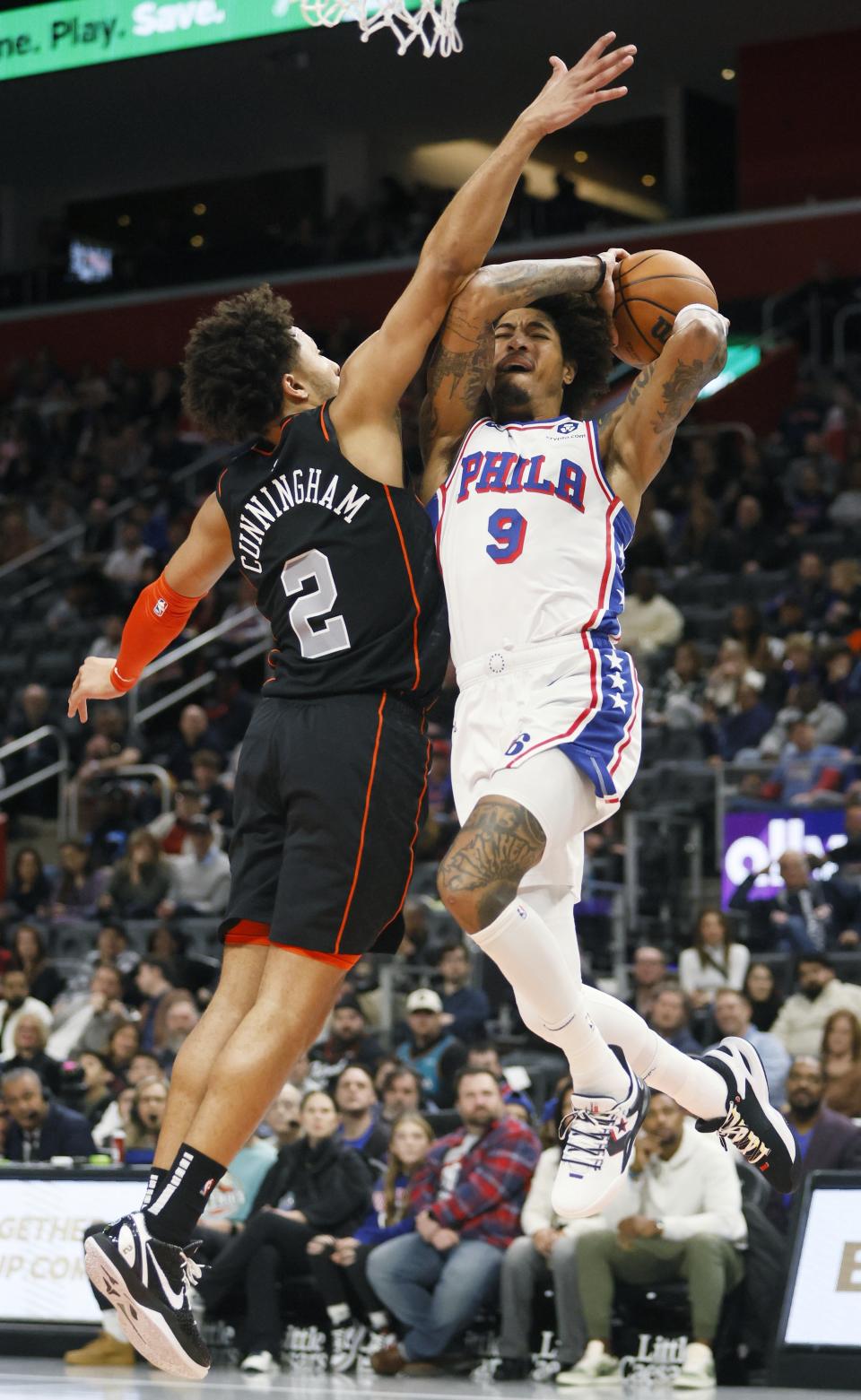 Philadelphia 76ers guard Kelly Oubre Jr. (9) goes to the basket against Detroit Pistons guard Cade Cunningham (2) during the first half of an NBA basketball game Friday, Nov. 10, 2023, in Detroit. (AP Photo/Duane Burleson)