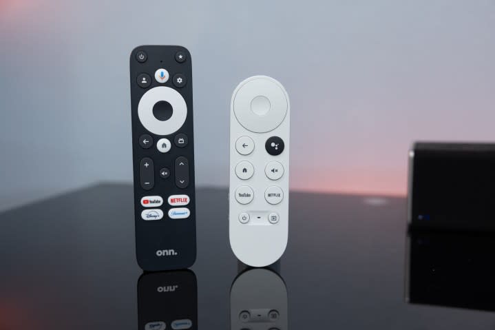 The Onn 4K Pro remote next to the Google Chromecast remote.