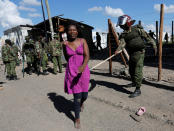 <p>A police officer prods a supporter of Kenyan opposition National Super Alliance (NASA) in Nairobi, Kenya, Nov. 28, 2017. (Photo: Thomas Mukoya/Reuters) </p>