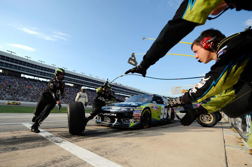 FORT WORTH, TX - NOVEMBER 06: Carl Edwards, driver of the #99 Aflac Ford, pits during the NASCAR Sprint Cup Series AAA Texas 500 at Texas Motor Speedway on November 6, 2011 in Fort Worth, Texas. (Photo by Jared C. Tilton/Getty Images for NASCAR)