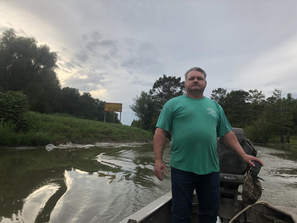 Like his father before him, Jody Meche, seen here in front of the spoil banks, was bred into crawfishing. His aptitude for it has allowed him to cash in on the freshwater crustaceans since the 1980s. (Photo: David Lohr/HuffPost)