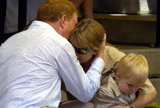 John Stainton comforting Terri Irwin and Robert. Photo: AAP