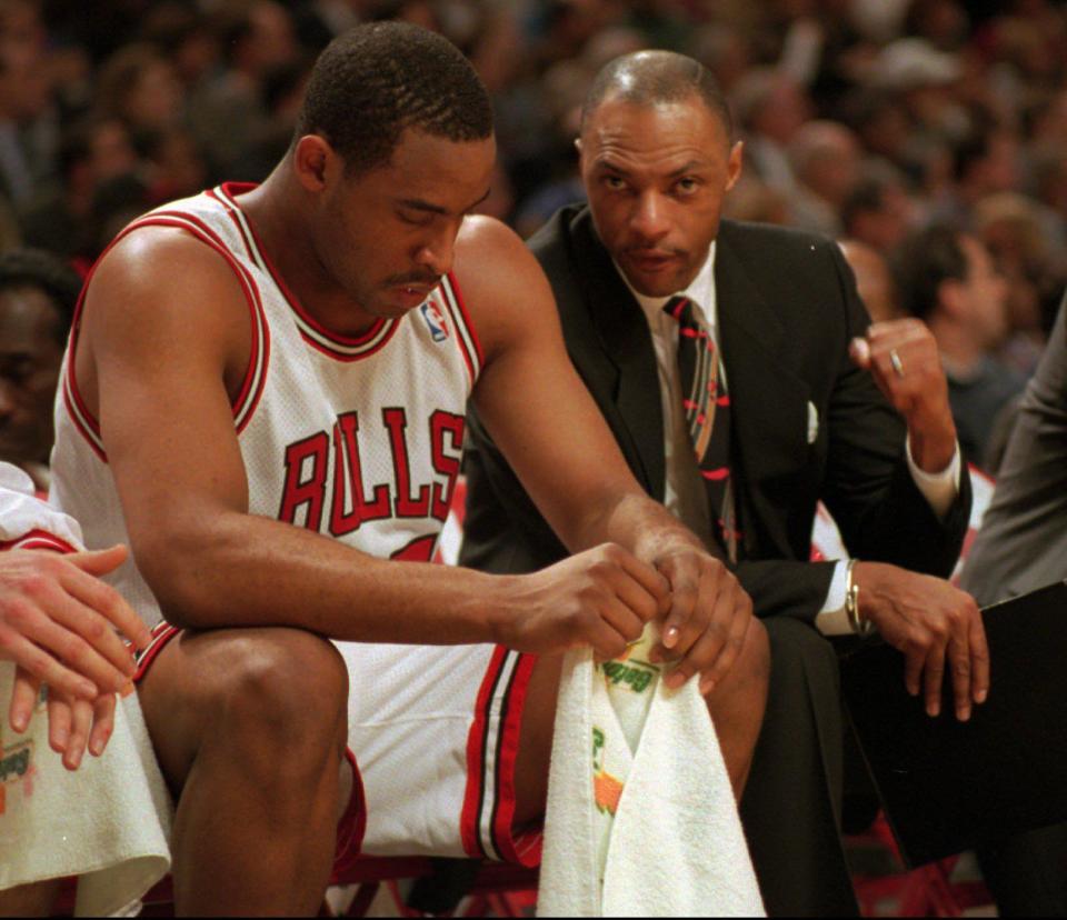 Jim Cleamons talks to Bulls player Jason Caffey during his tenure as an assistant coach with Chicago. Cleamons said every offseason Michael Jordan &#8220;came back with something else in his package. That's the brilliance of him as an athlete.&#8221;