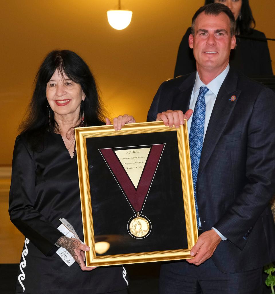 U.S. Poet Laureate Joy Harjo receives the Oklahoma Cultural Treasure honor from Gov. Kevin Stitt at the Governor's Arts Awards for Excellence in the Arts at the Capitol, Tuesday, November 9, 2021.