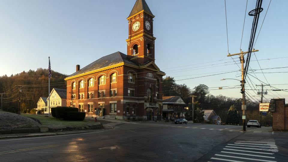 town hall catches the early morning sunlight, thursday, nov 16, 2023, in hinsdale, nh the small town in southwestern new hampshire received a gift of $38 million from the estate of geoffrey holt, a longtime trailer park resident ap photorobert f bukaty