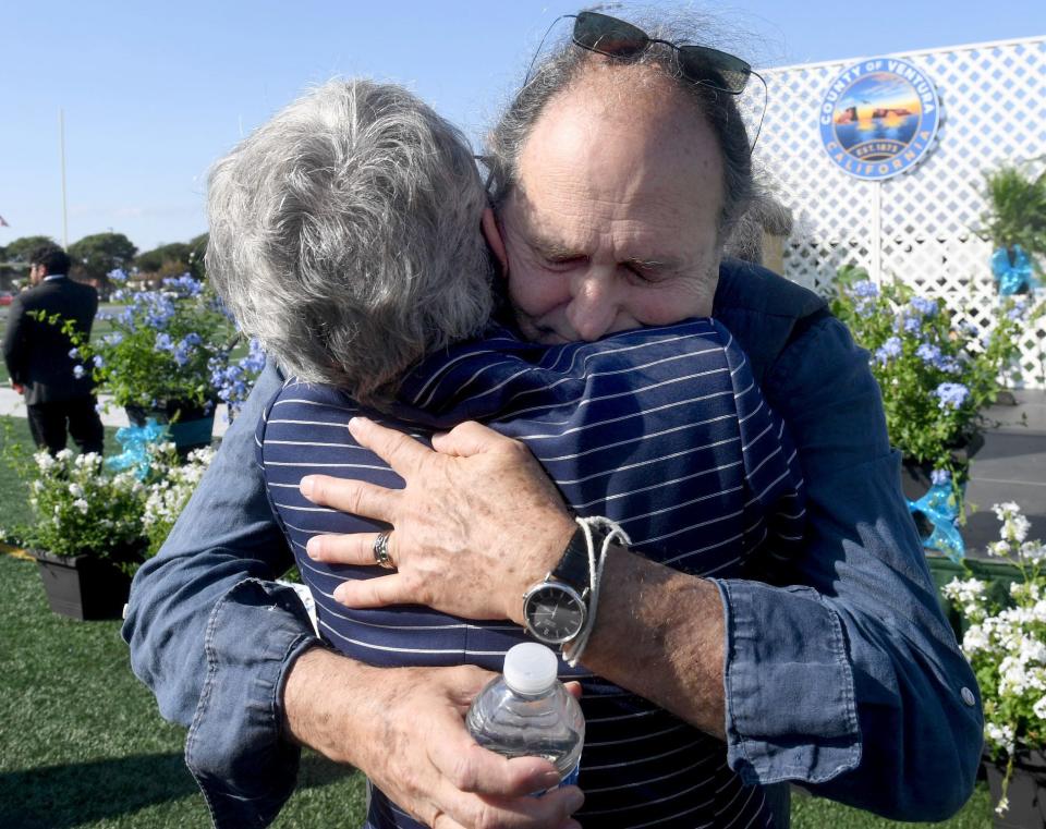 Hannah-Beth Jackson, former state senator from Santa Barbara, hugs Roy Prince, husband of the late Ventura County Supervisor Carmen Ramirez, at a public memorial observance in October 2022.