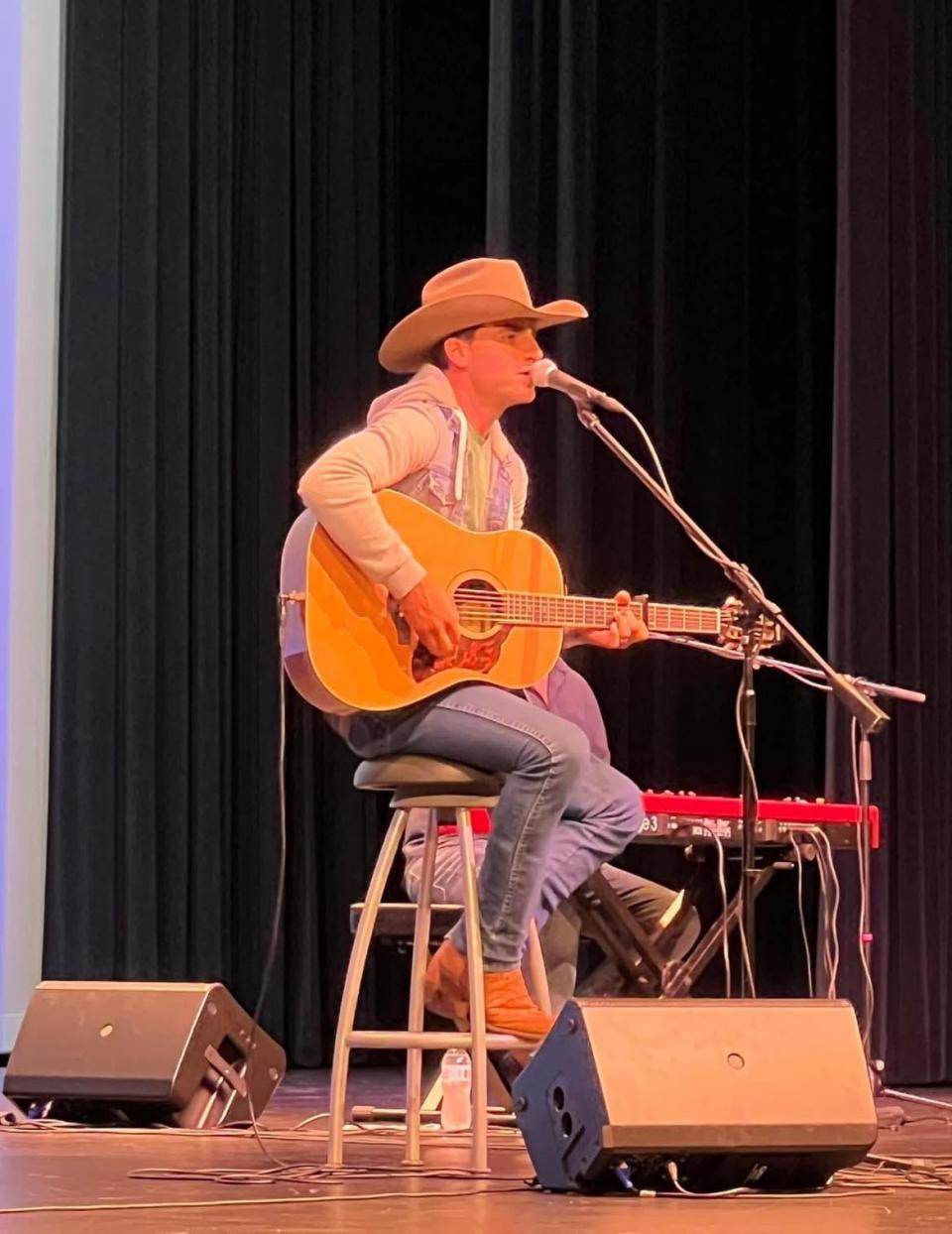 Country music artist Mitch Rossell performs in November at the Performing Arts Center at Canton South High School. Rossell returns to the school for a May 13 show.