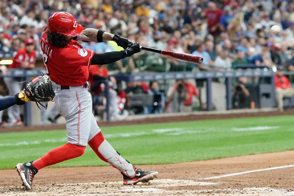 Cincinnati Reds' Jonathan India hits a double during the fifth inning of a baseball game Wednesday, July 26, 2023, in Milwaukee.